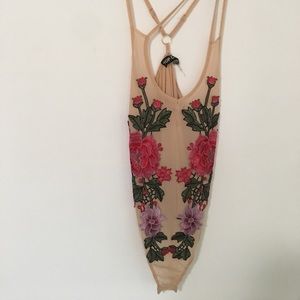 Embroidered body suit